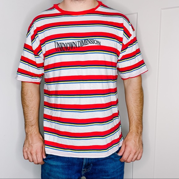 white graphic tee with red writing